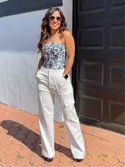 Corsé blanco con espalda azul y rosa con lazo